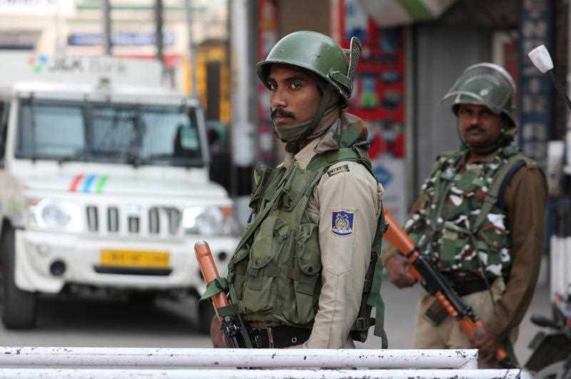 Indian paramilitary soldiers stand guard in Srinagar, Kashmir, 17 October 2019.