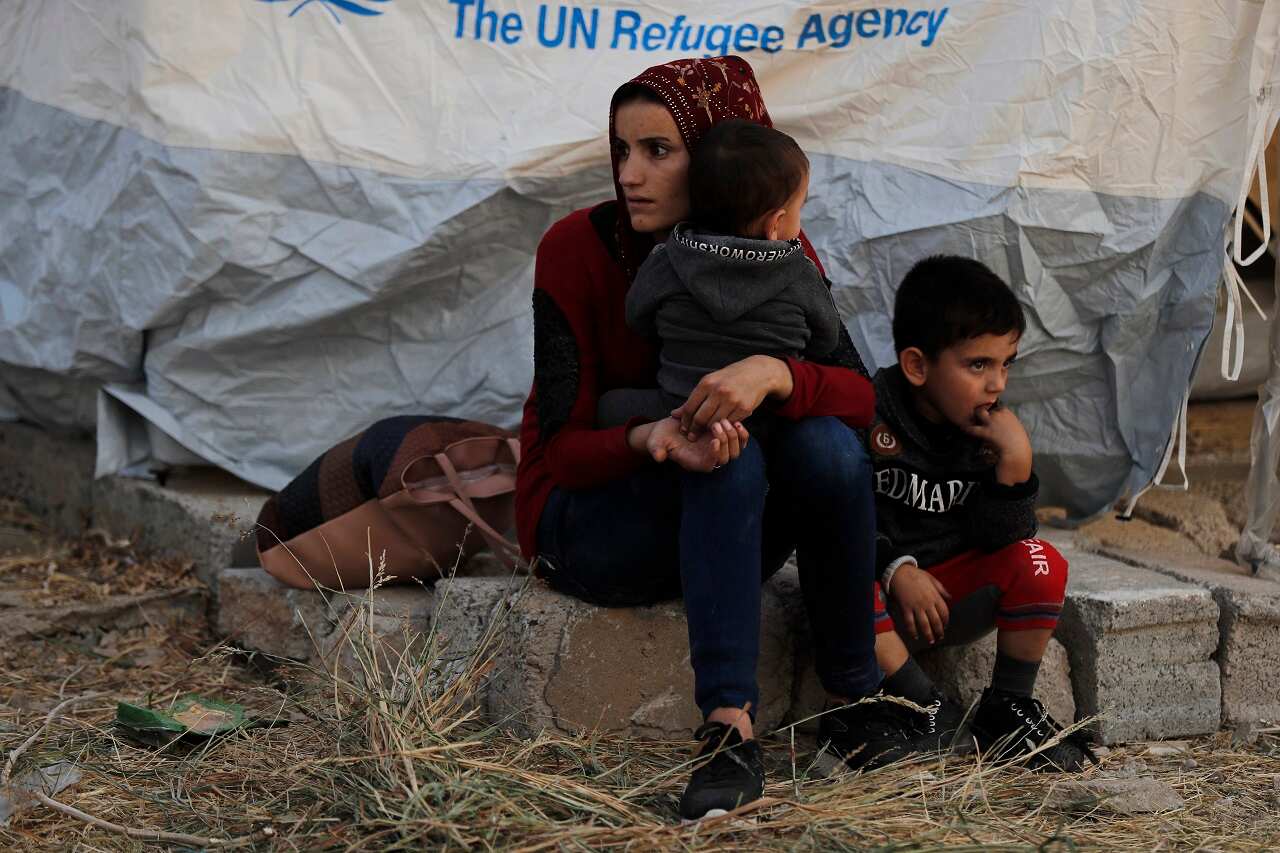 A Syrian mother and her children.