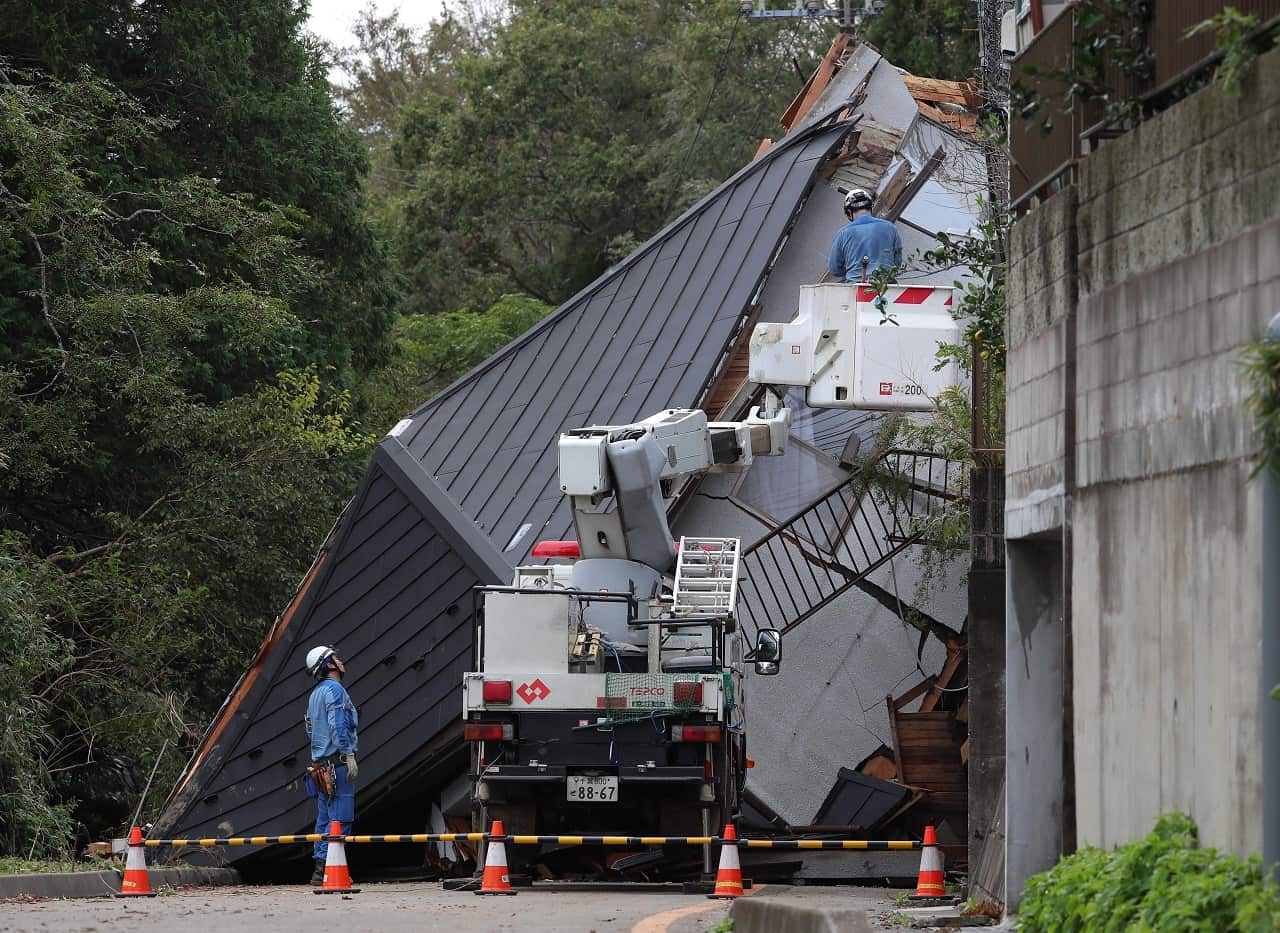 A collapsed house, brought down by torrential rain in Chiba.
