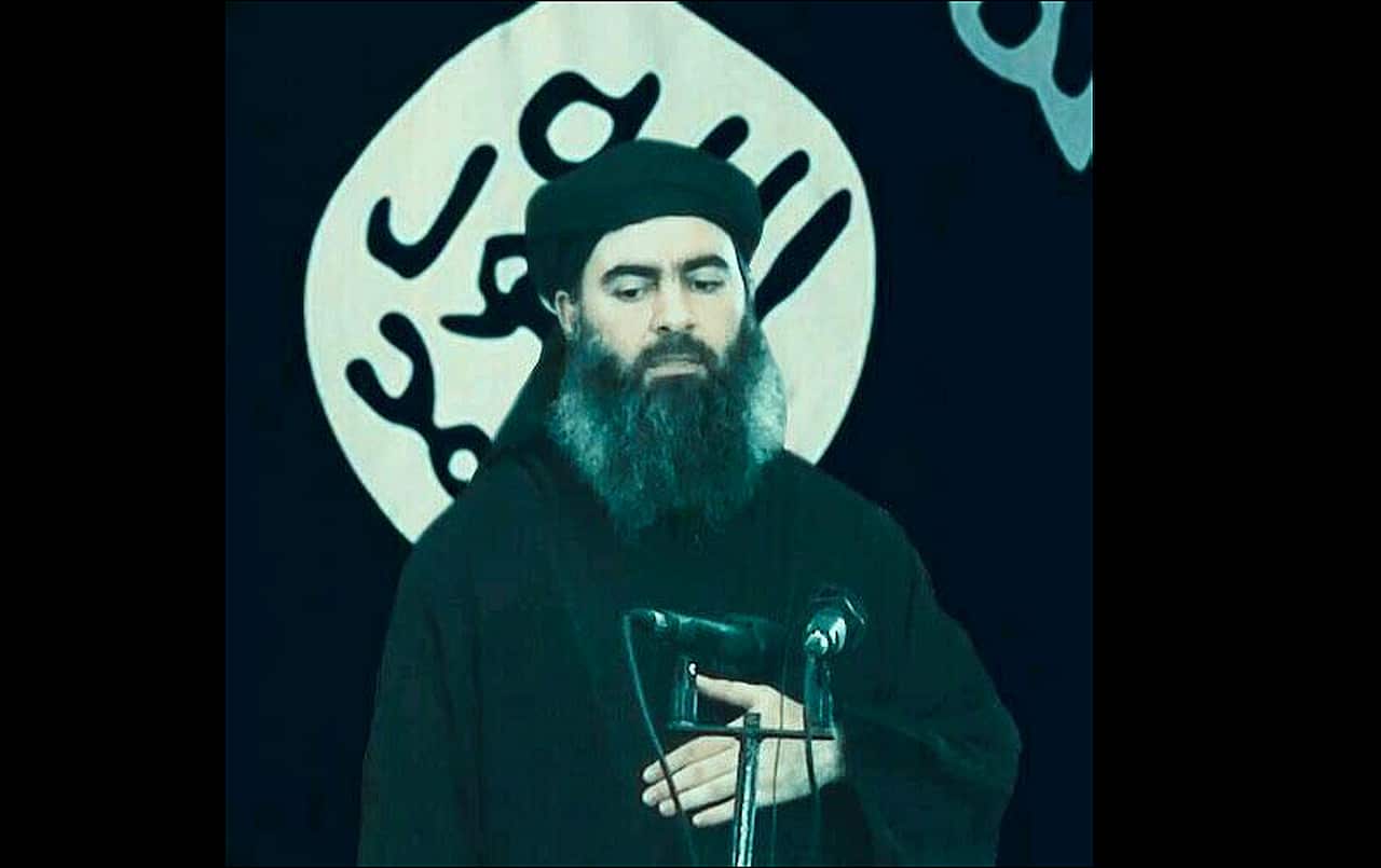 The leader of IS, Abu Bakr al-Baghdadi during his first public appearance at a mosque in Mosul, July 5, 2014.