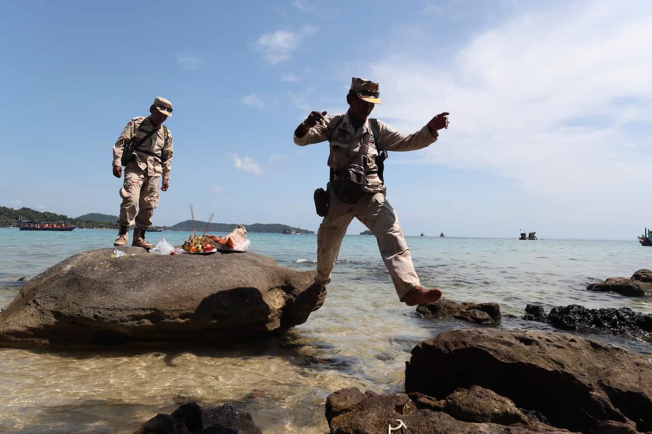 Koh Rong island officers searching for missing backpacker Amelia Bambridge. 