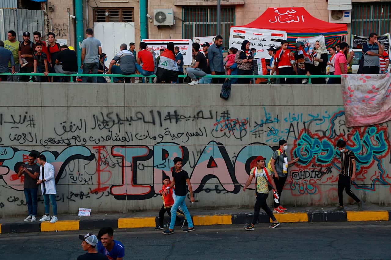 Anti-government protesters gather near Tahrir Square during ongoing protests in Baghdad, Iraq, Saturday, Nov. 2, 2019. (AP Photo/Khalid Mohammed)