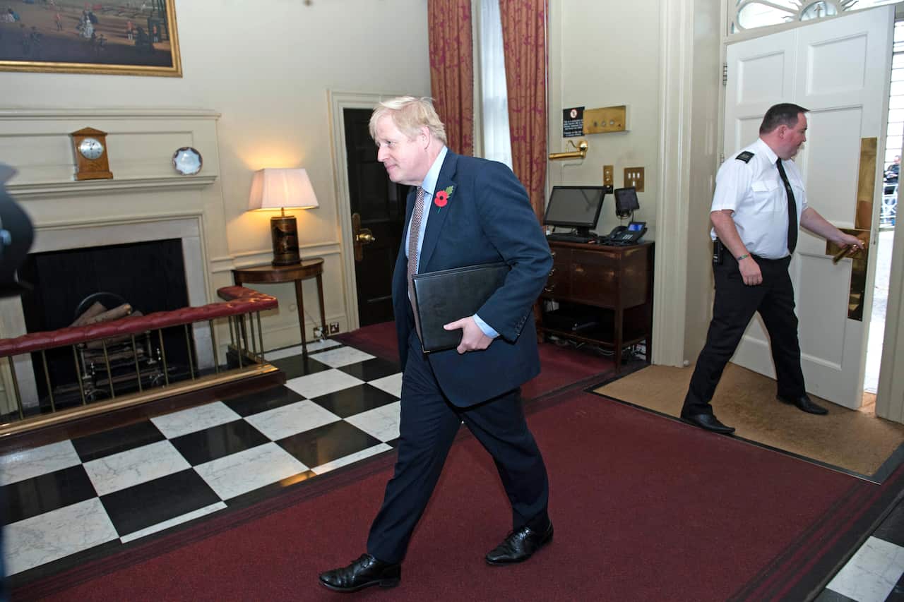 Boris Johnson goes back into 10 Downing Street, having addressed the nation from the street.