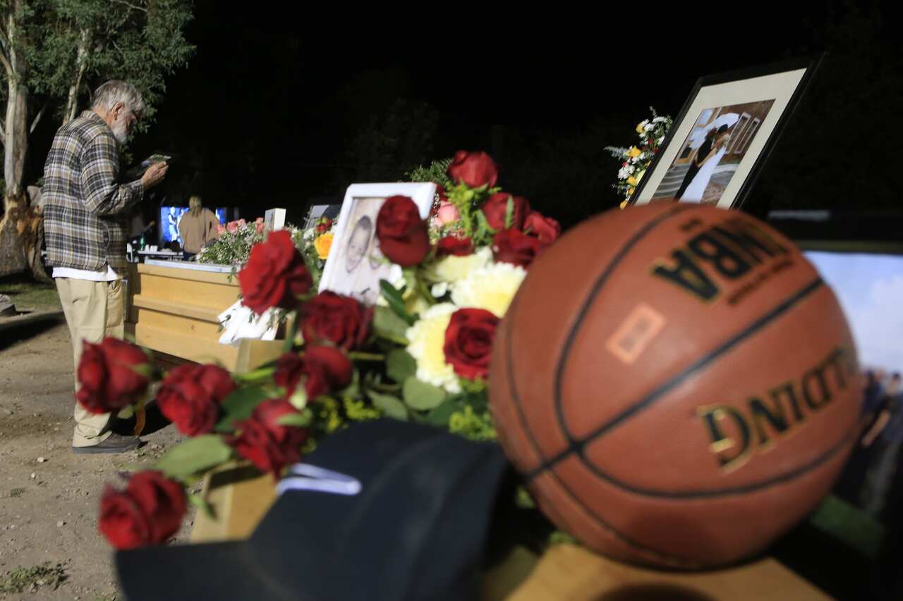 Family and friends mourn over Rhonita, 30, one of the victims of the Mormon community, who were attacked by drug traffickers in the state of Sonora, Mexico.