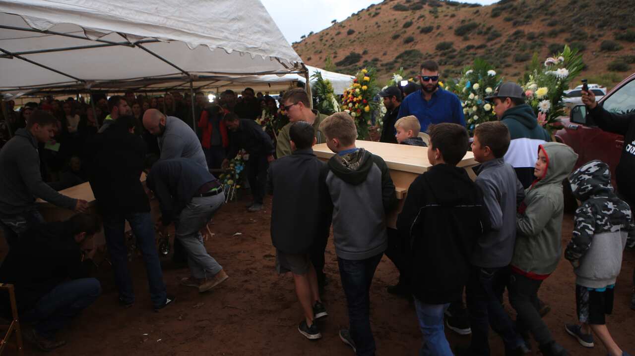 Relatives and friends attend the funeral of the LeBaron family in La Mora, Sonora, Mexico.