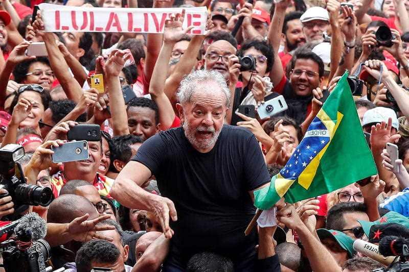 Supporters of Brazilian former President Luiz Inacio Lula da Silva (C) carry him on their shoulders in Sao Bernardo do Campo,
