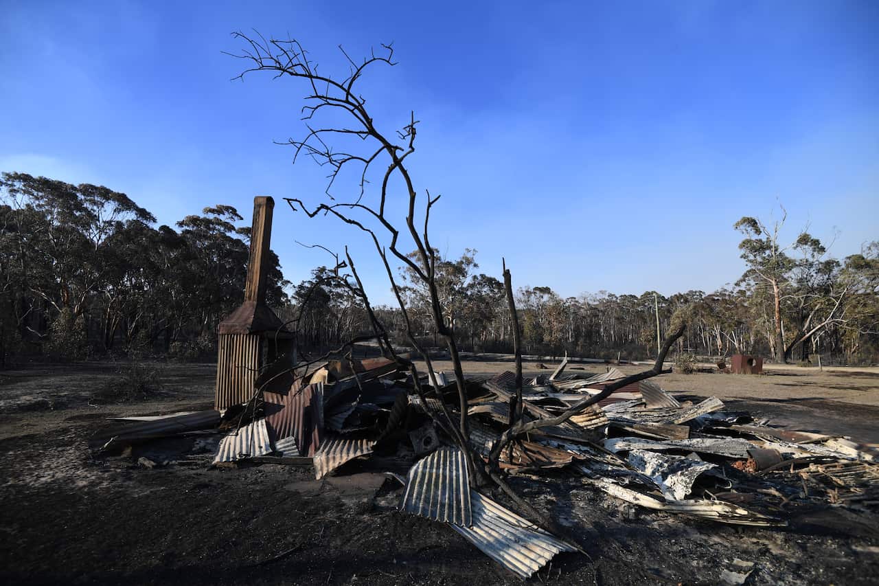 The remains of a house destroyed by a bushfire are seen in Torrington, near Glen Innes, Sunday, November 10, 2019. There are more than 80 fires burning around the state, with about half of those uncontained. (AAP Image/Dan Peled) NO ARCHIVING