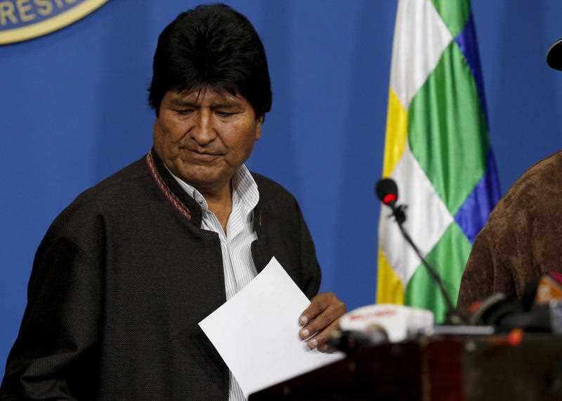 Bolivia's President Evo Morales looks down during a press conference in La Paz, Bolivia, Sunday, Nov. 10