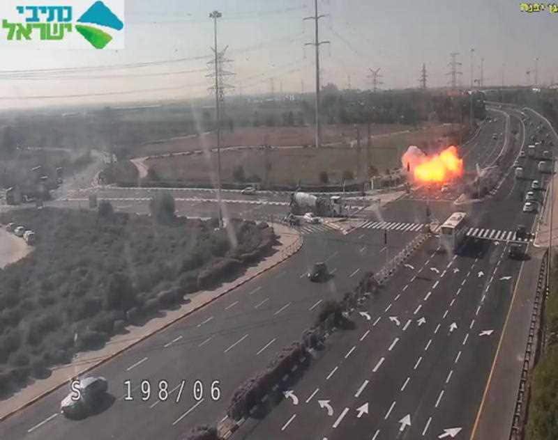 A frame grab taken from CCTV video made available by Israel's national roads authority Netivei Israel shows the moment a rocket apparently fired from Gaza