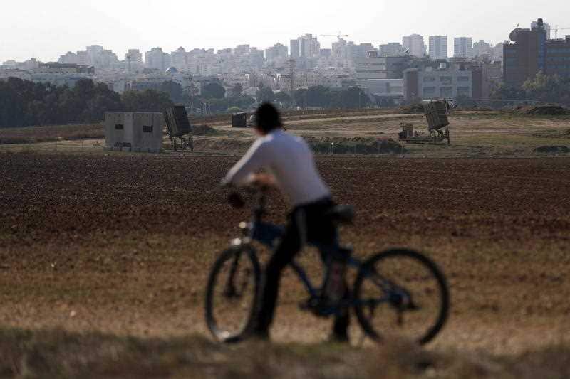 A person looks at Iron dome missile system near the city of Ashdod, south of Israel, 12 November 2019.