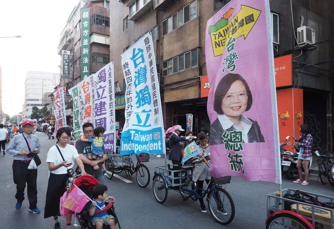 Banners showing Taiwan's President Tsai Ing-wen are on display near Tsai's campaign rally in Taipei, Taiwan, 17 November 2019.
