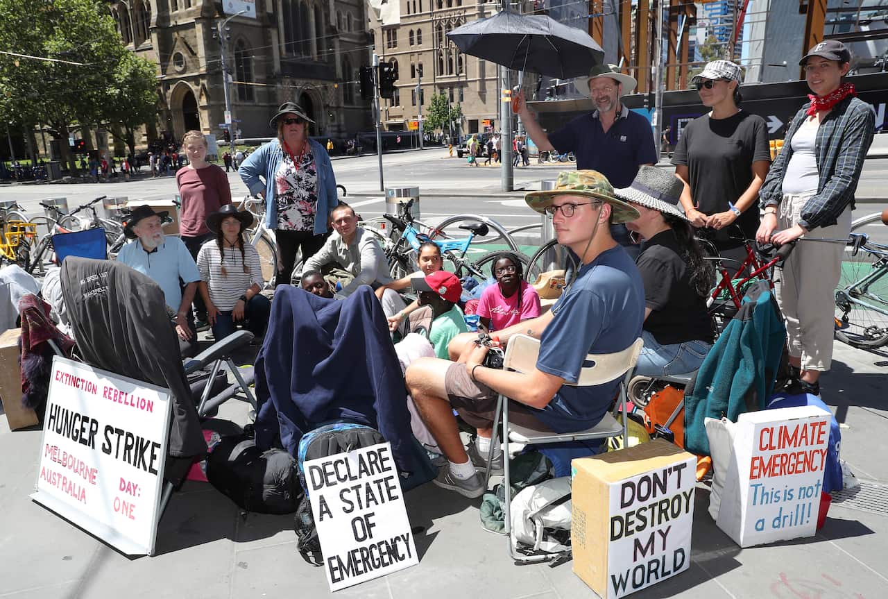 Extinction Rebellion protesters outside of Flinders Street Station in Melbourne on Monday.