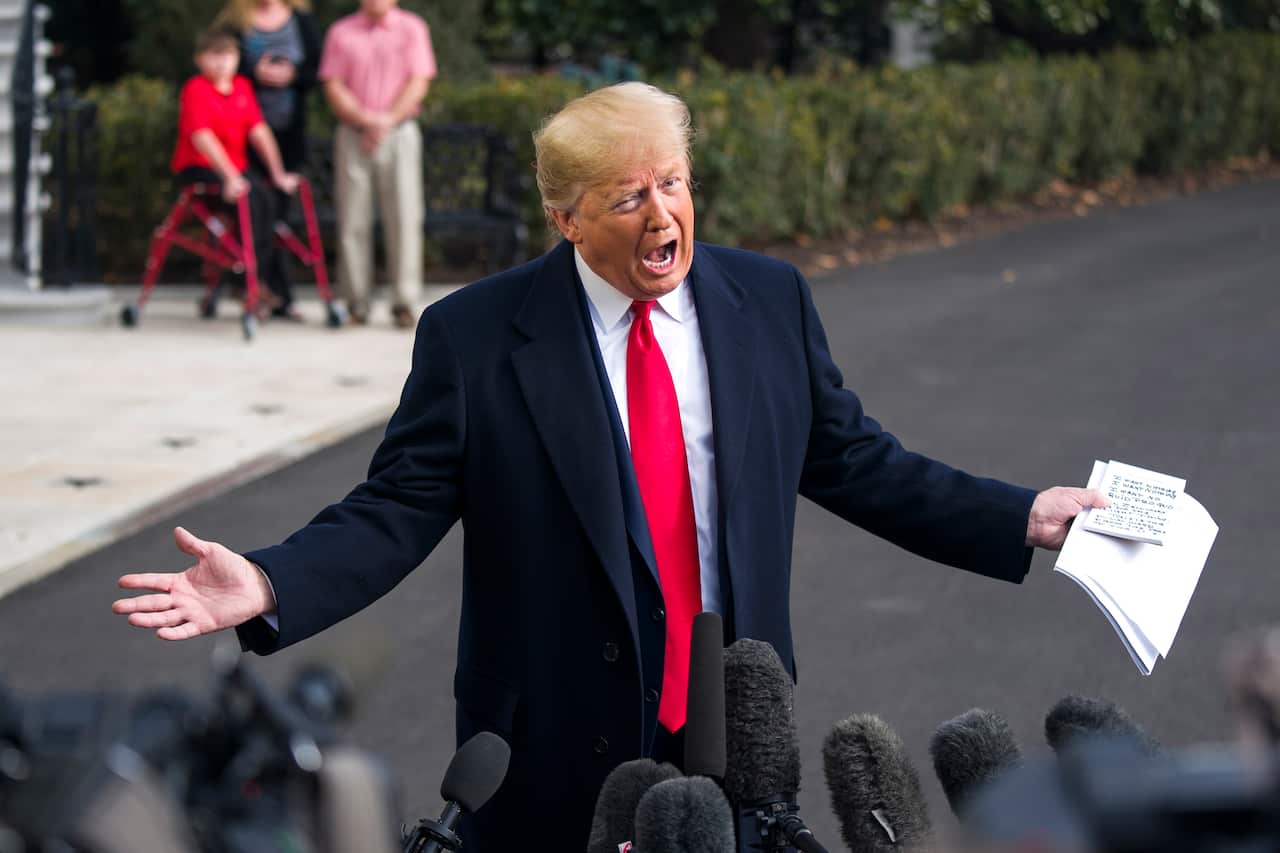 US President Donald Trump speaks to the media about the impeachment proceedings on Wednesday.