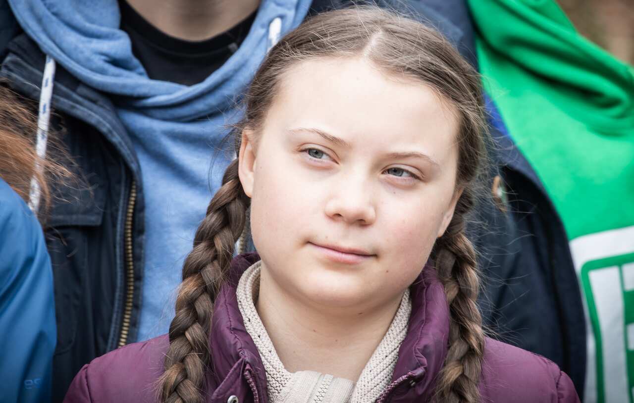 29 March 2019, Berlin: The environmental activist Greta Thunberg participates together with students in the climate demonstration.