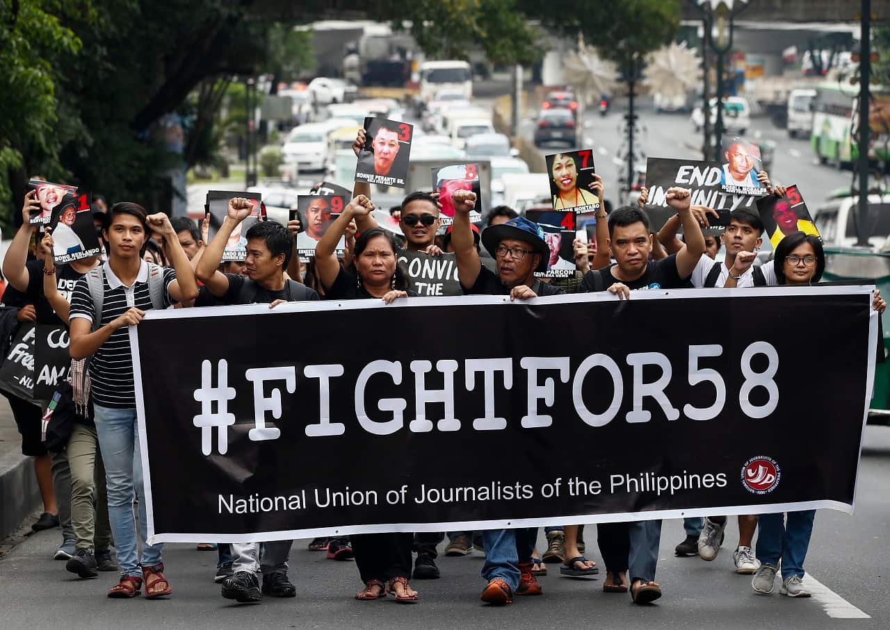 A march in Manila marking the 10th-year commemoration of the Ampatuan massacre.