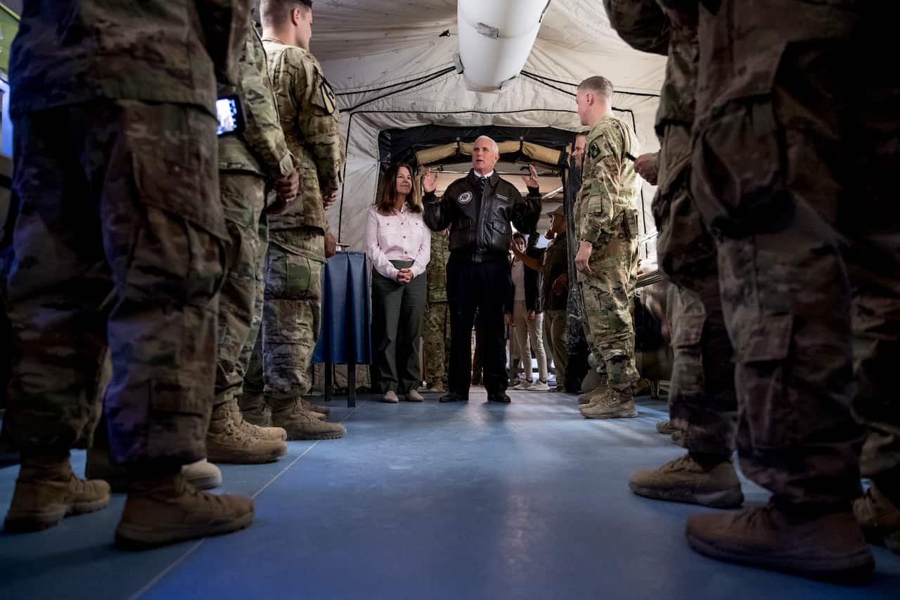 US Vice President Mike Pence and Second Lady Karen Pence speak with troops at Erbil International Airport in Erbil, Iraq.