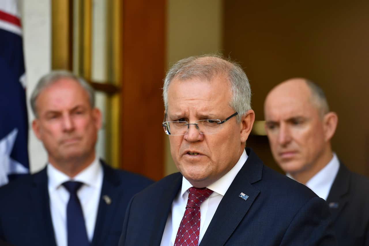 Minister for Aged Care Richard Colbeck, Prime Minister Scott Morrison and Minister for Government Services Stuart Robert.