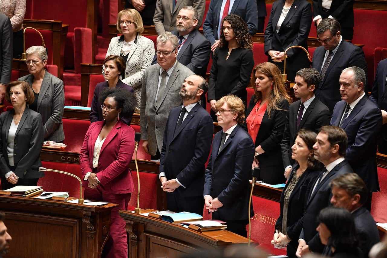 French members of Parliamentobserve a moment of silence in tribute to the troops who where killed in helicopter crashes on November 26 in Mali.