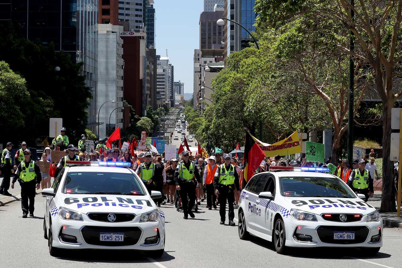 Activists from School Strike 4 Climate and Extinction Rebellion march towards the Parliament of Western Australia.