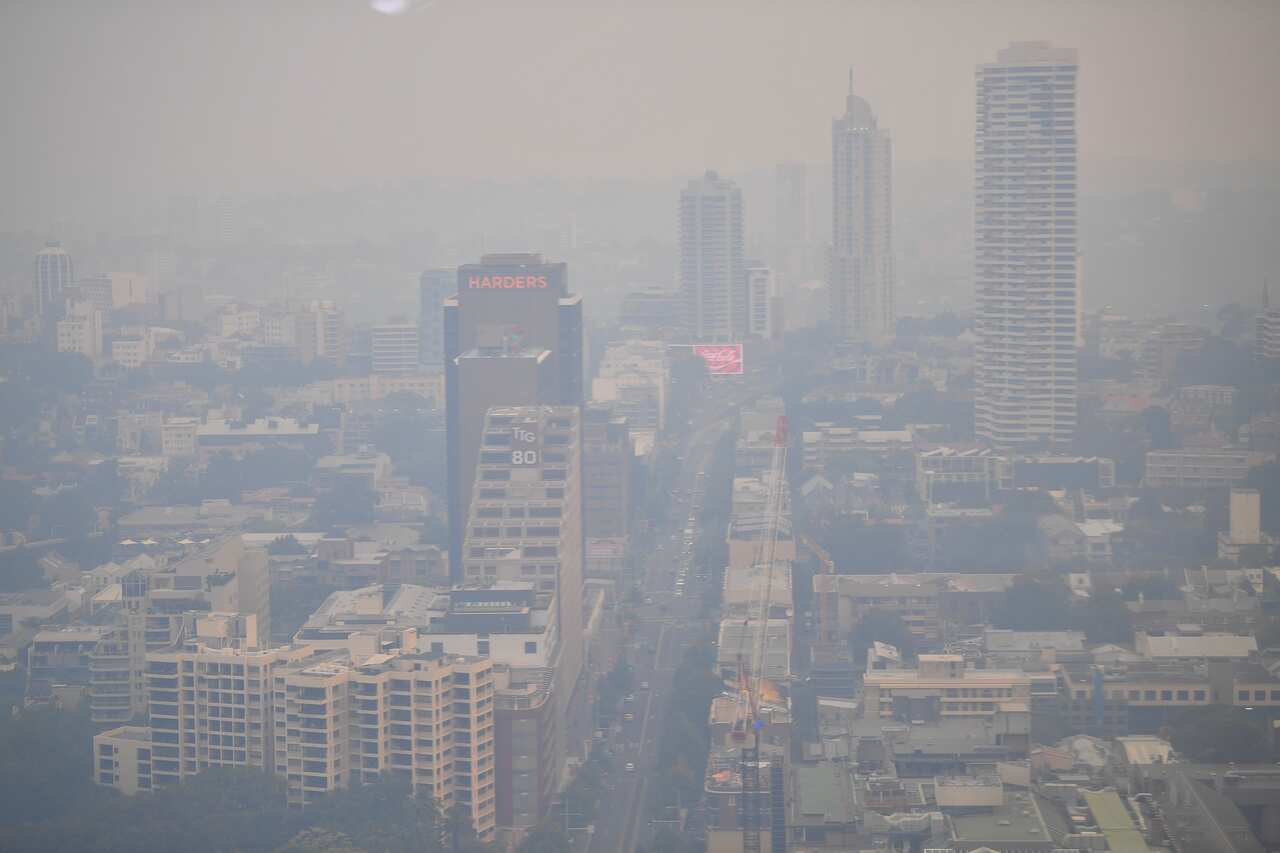 Kings Cross can be seen as smoke haze from bushfires in New South Wales blankets the CBD in Sydney, Monday, December 2, 2019. (AAP Image/Steven Saphore) NO ARCHIVING
