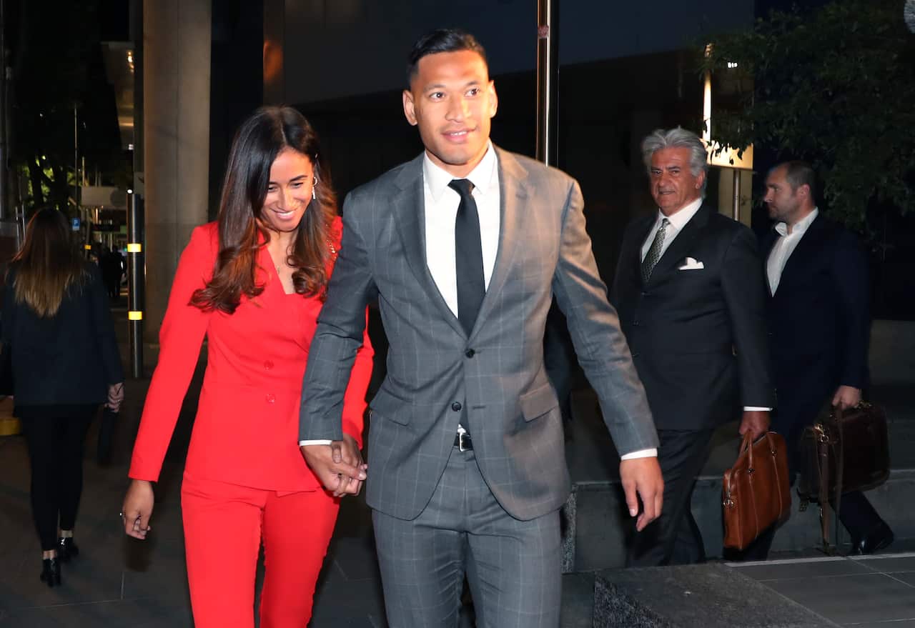 Israel Folau and his wife Maria leave the Federal Court in Melbourne after a long mediation with Rugby Australia.