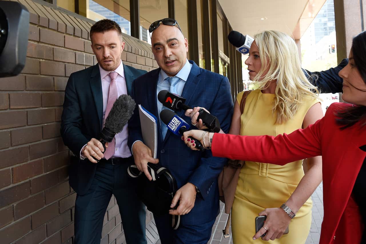 Lawyer Kiki Kyriacou (centre) leaves the Parramatta Local Court in Sydney, Thursday, December 5, 2019. Youssef Uweinat, a 21 year old from Riverwood, has been arrested in relation to alleged terrorism offences. (AAP Image/Bianca De Marchi) NO ARCHIVING