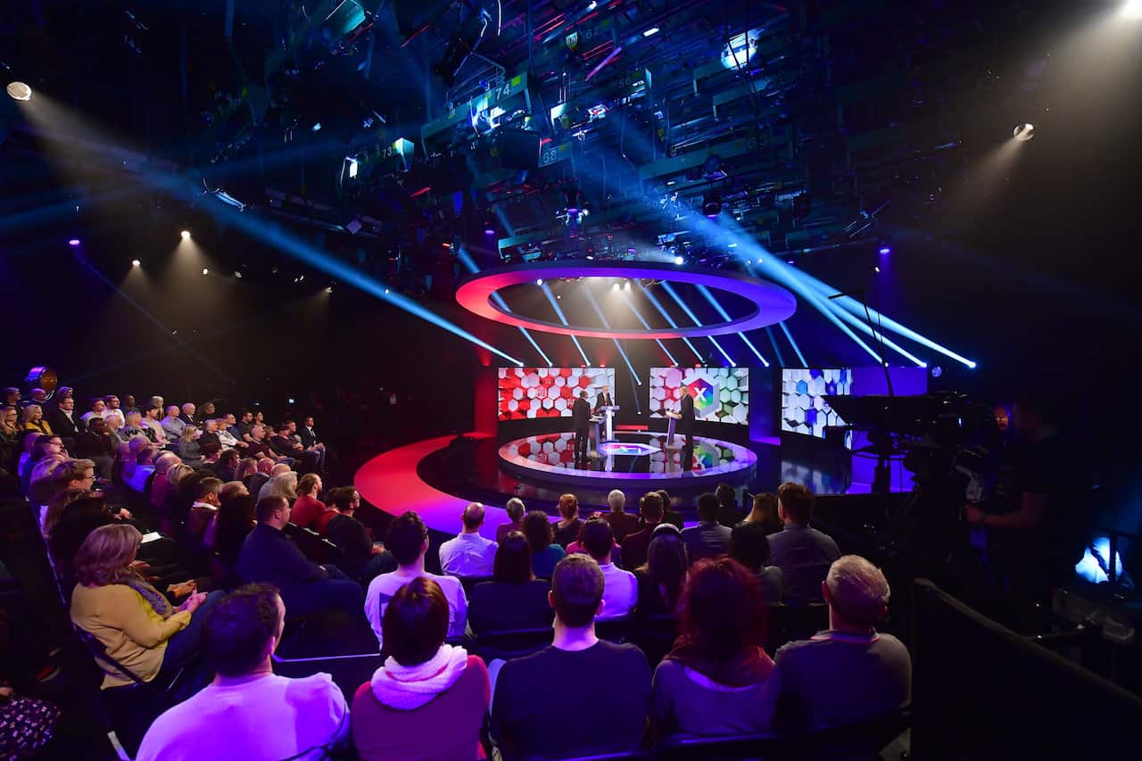 British Prime Minister Boris Johnson (R) and opposition Labour party leader Jeremy Corbyn (L) during a BBC TV debate.