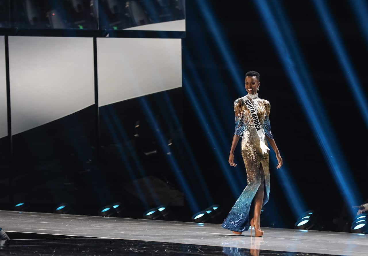 Miss South Africa Zozibini Tunzi walks on stage.