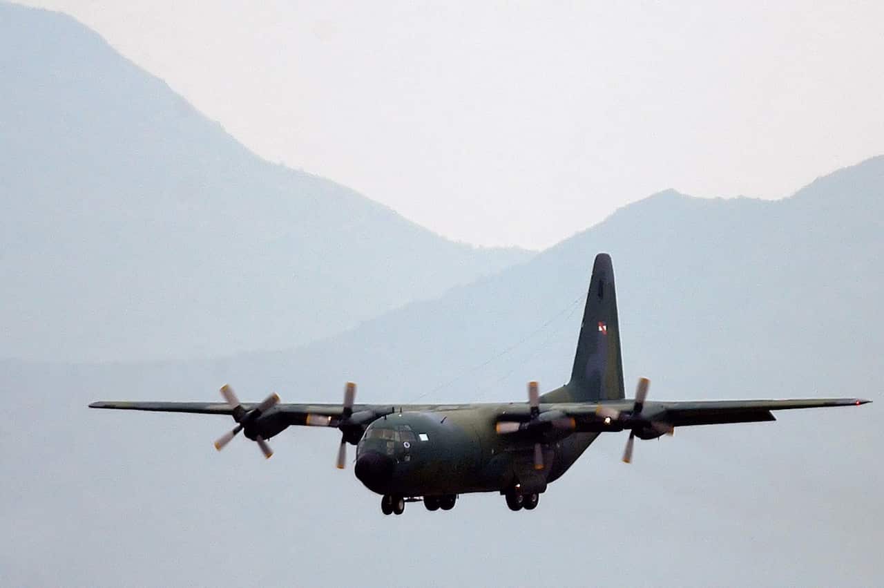 (FILE) A C-130 military transport plane arrives at Arturo Merino Benitez International Airport in Santiago de Chile.