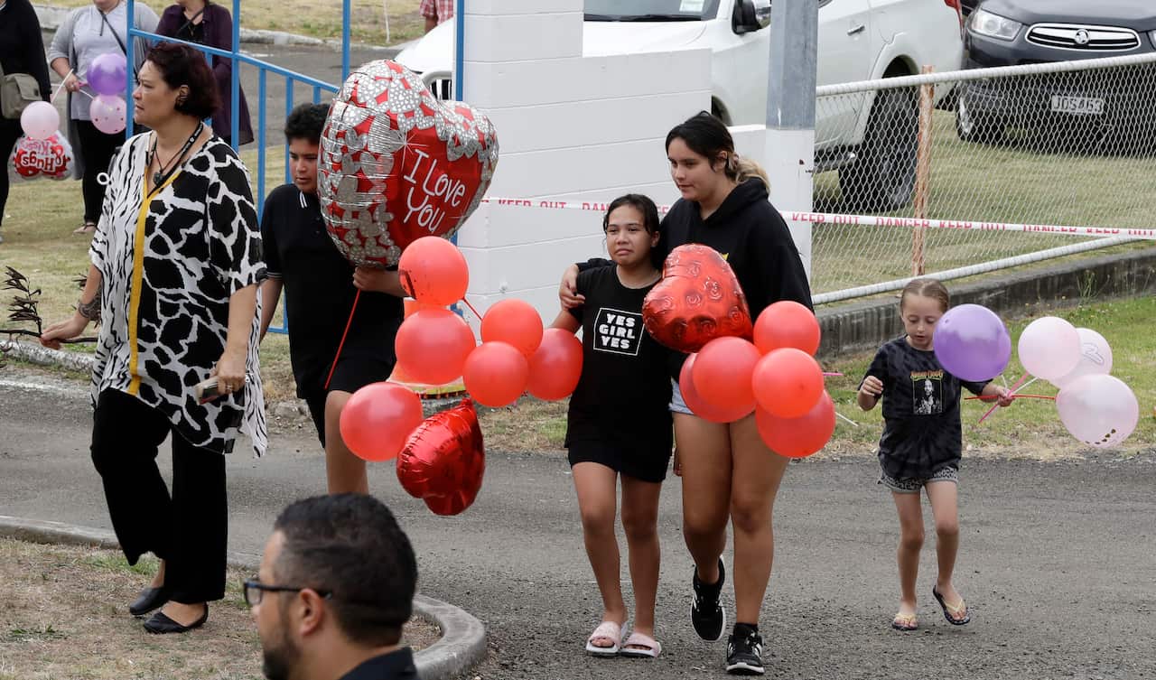 Families arrive at the Whakatane wharf following a blessing at sea.