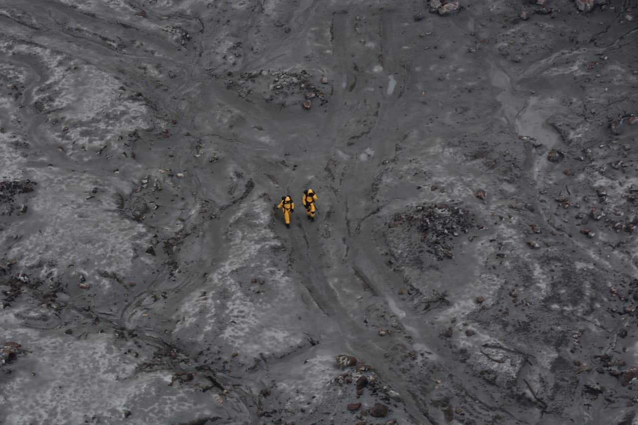 Authorities are seen during a recovery operation on White Island, New Zealand.