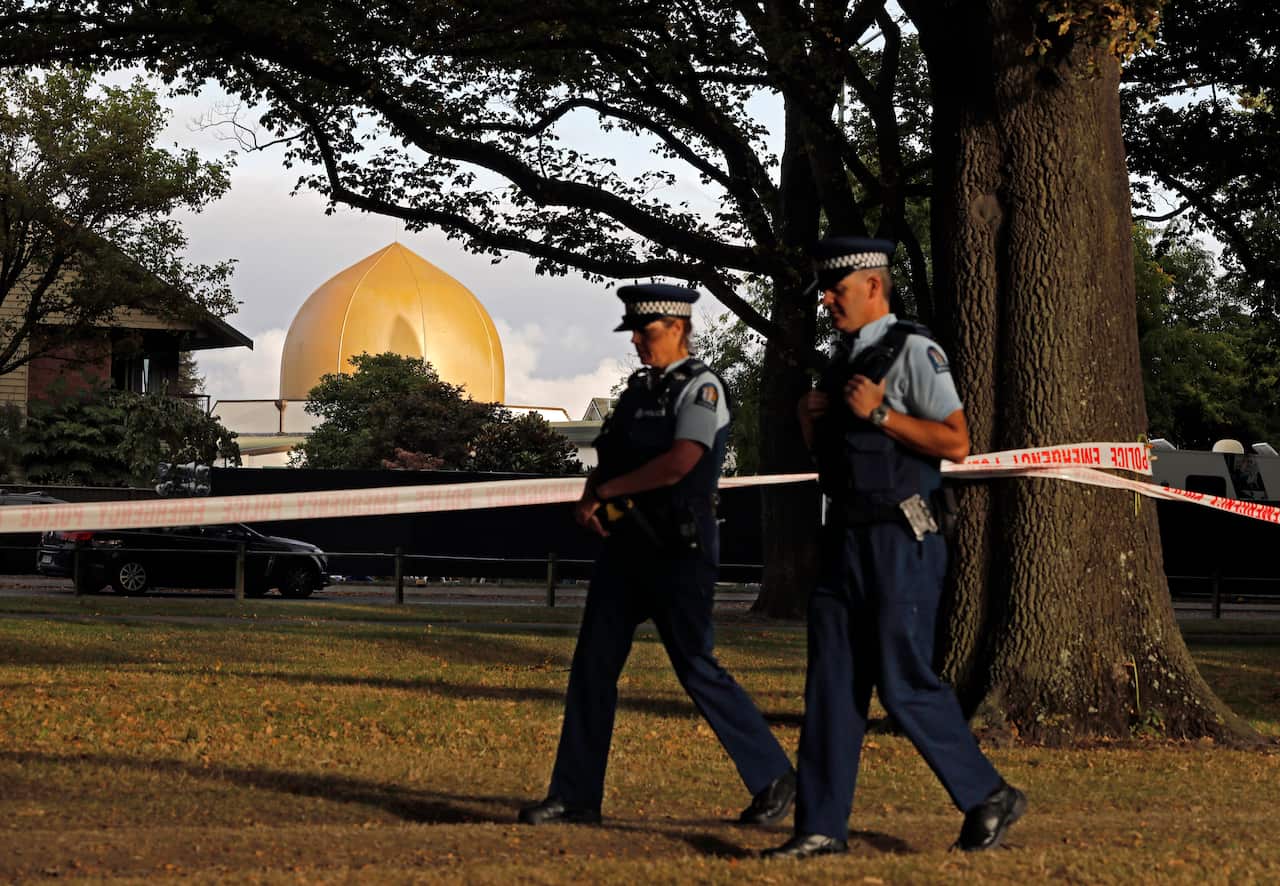 Police officers patrol at a park outside the Al Noor mosque in Christchurch, New Zealand in March last year. 