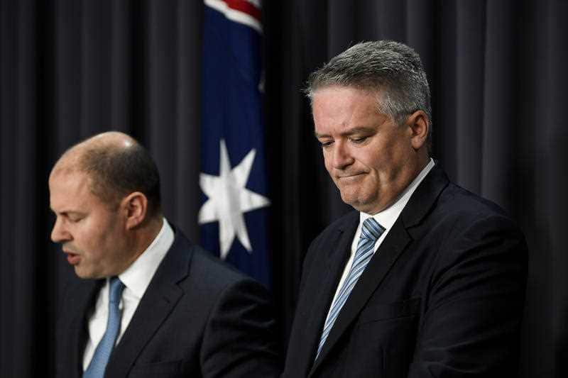 Australian Finance Minister Mathias Cormann speaks during a press conference as he hands down the Mid-Year Economic and Fiscal Outlook 2019/20.