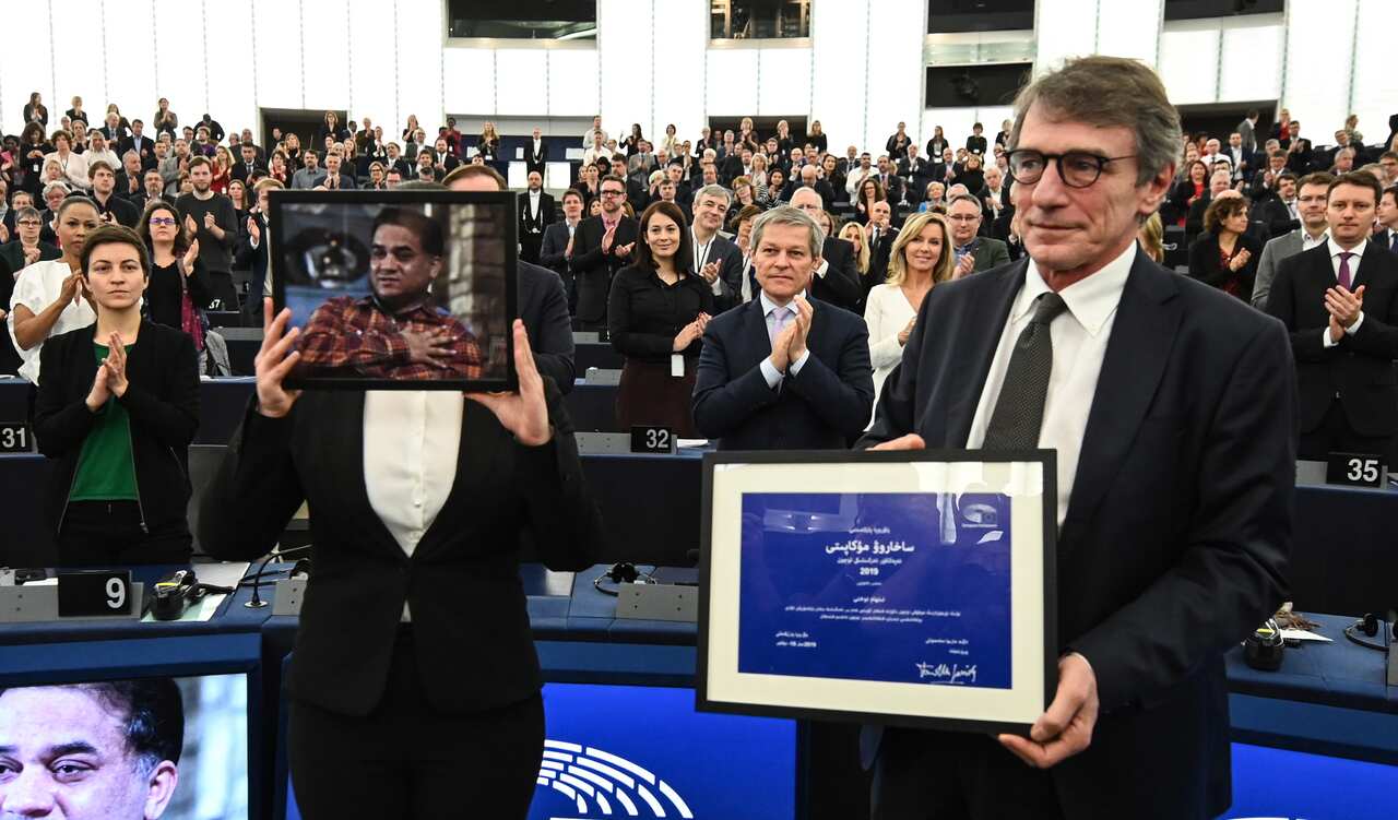 European Parliament President David-Maria Sassoli stands next to Jewher Ilham, daughter of Ilham Tohti, Uyghur economist and human rights activist.