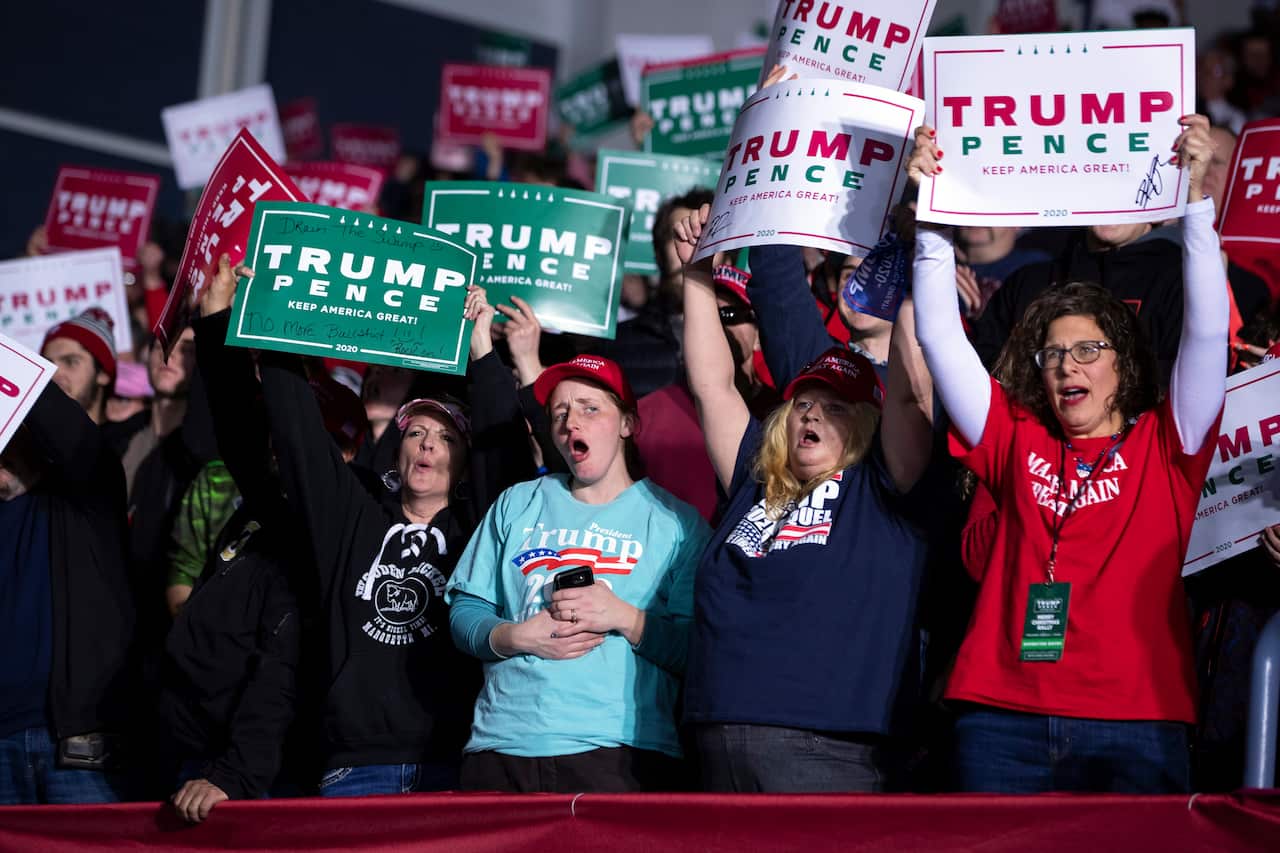 Supporters of President Donald Trump cheer during a campaign rally, Wednesday, Dec. 18, 2019, in Battle Creek, Mich. (AP Photo/ Evan Vucci)