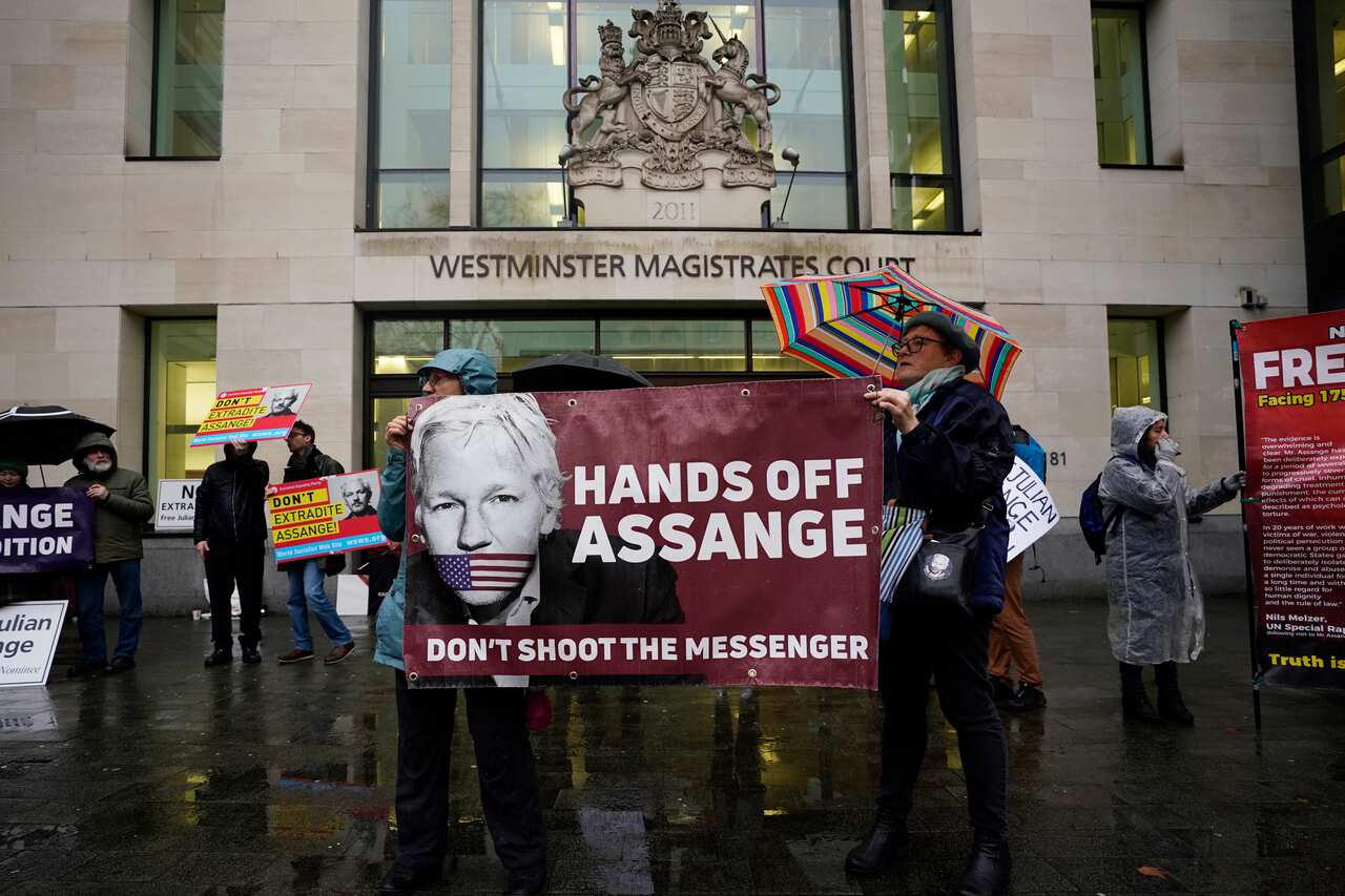 Supporters of Julian Assange protest outside Westminster Magistrates Court