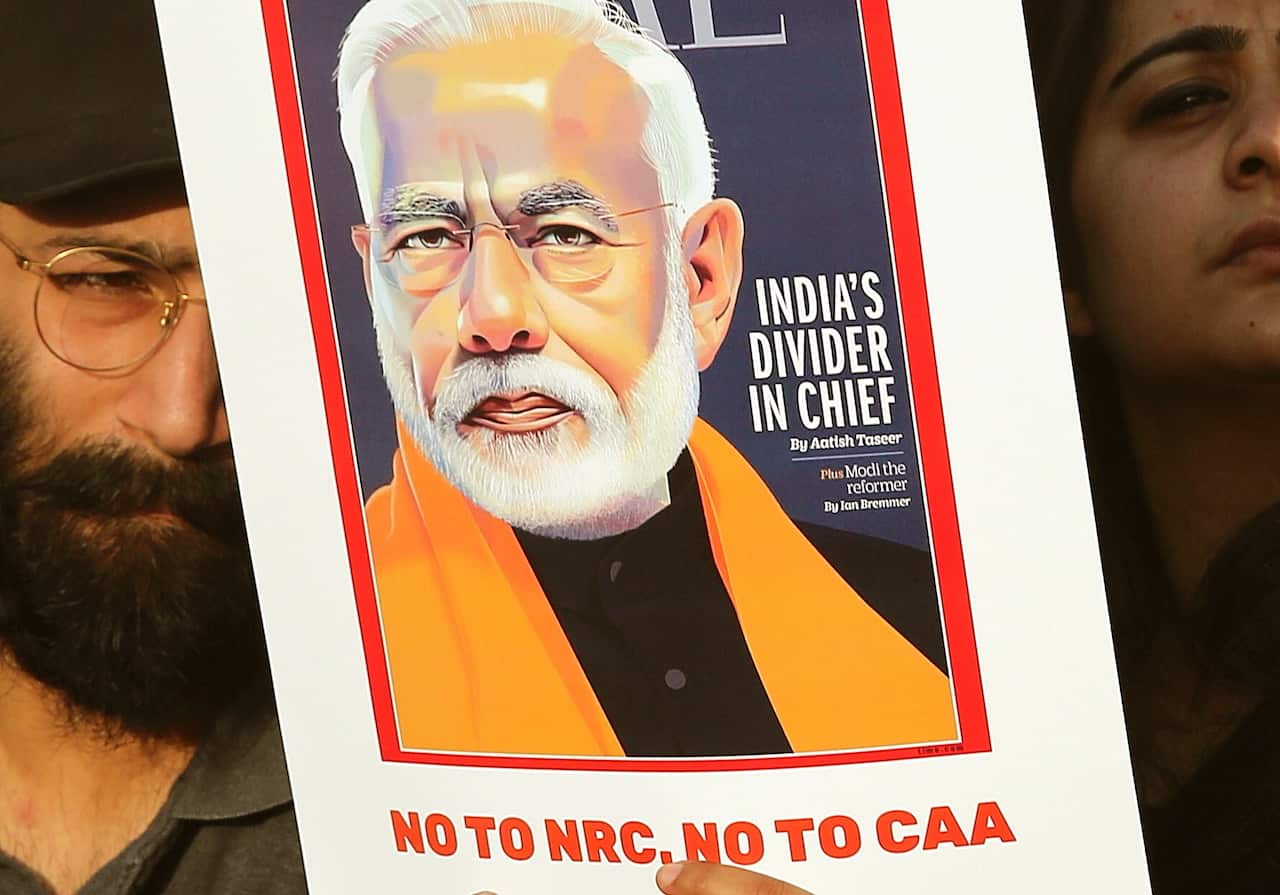 Protesters holds placard and shouts slogans during a protest in solidarity against the Citizenship Amendment Bill (CAB) and National Register of Citizens (NRC).