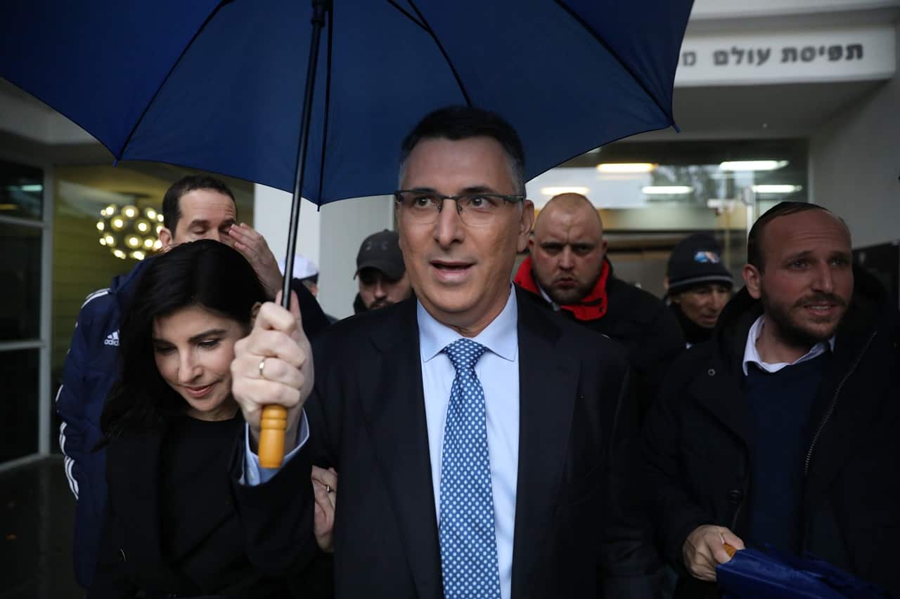 Member of Israel's Likud party Gidon Saar arrives to cast his ballot during a primary election vote.