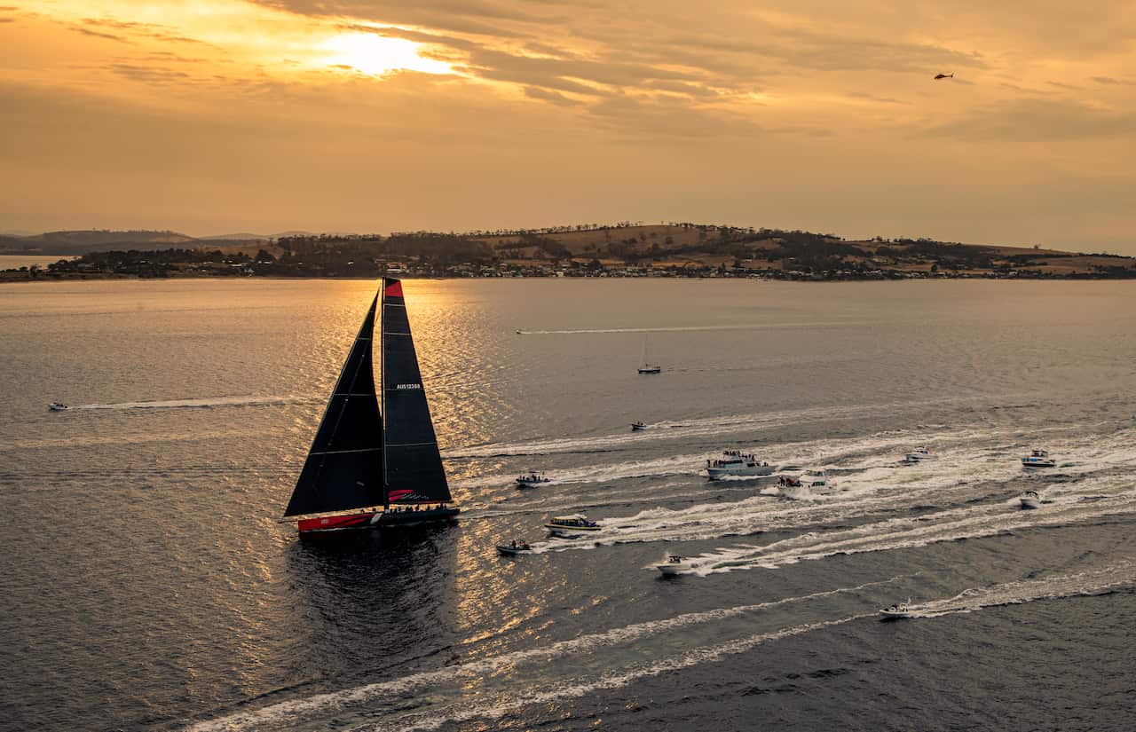 A supplied image obtained on Saturday, December 28, 2019, shows Comanche arriving to Hobart to claim Line Honours victory at the 2019 Rolex Sydney Hobart. (AAP Image/Supplied by Rolex, Carlo Borlenghi) NO ARCHIVING, EDITORIAL USE ONLY