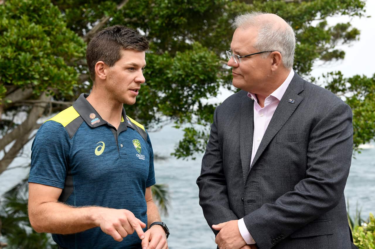 Australian cricket captain Tim Paine and Prime Minister Scott Morrison during a New Year's reception for aine and Prime Minister Scott Morrison during a New Year's reception for the Australian and New Zealand cricket teams.