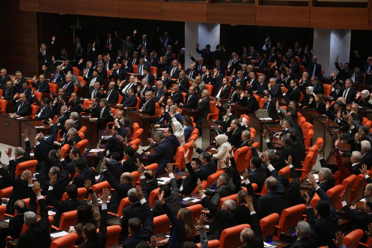 Members of Turkish parliament vote to send Turkish forces to Libya.