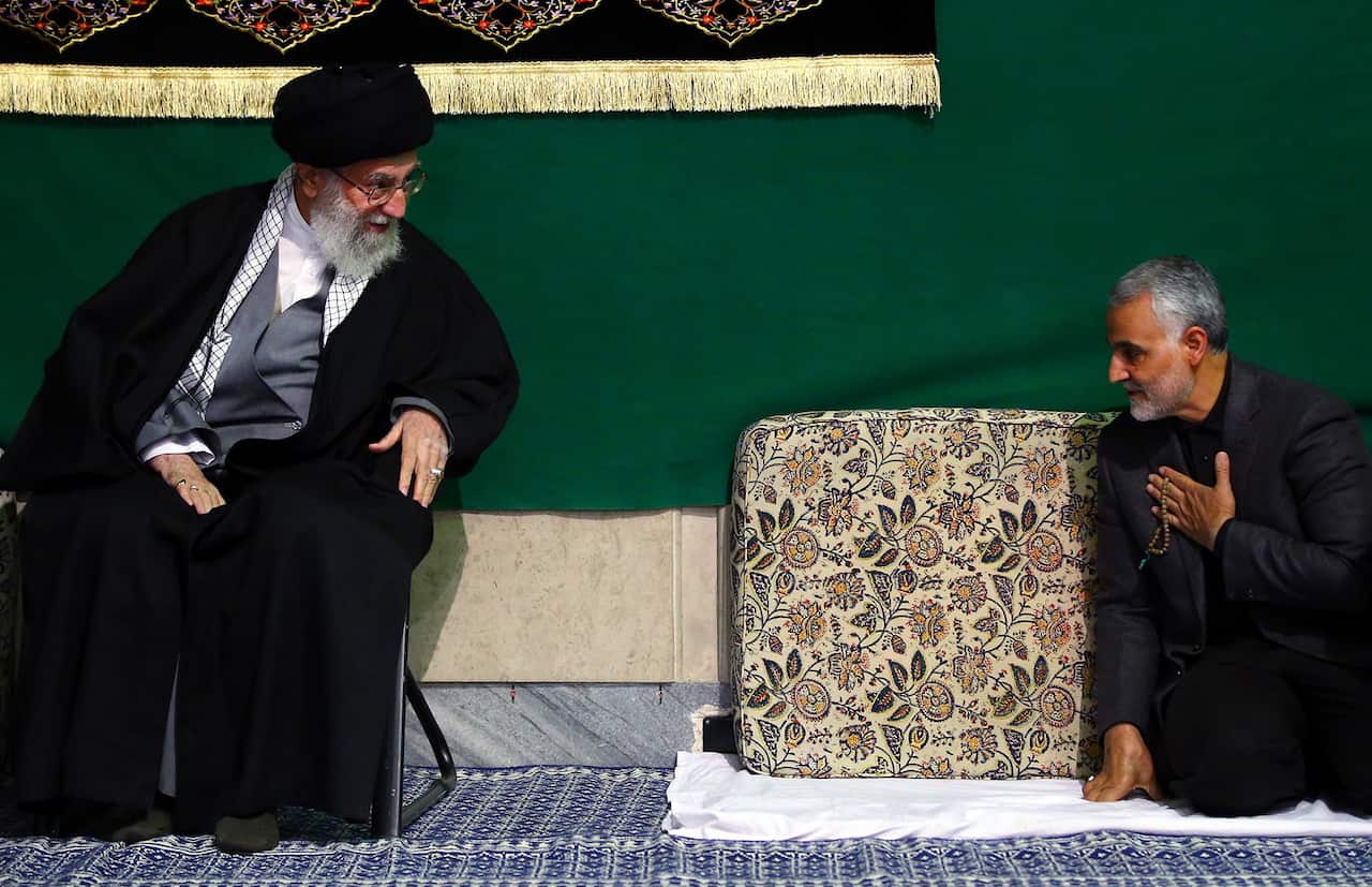 Iran's Supreme Leader Ayatollah Ali Khamenei greets Qasem Soleimani during a religious ceremony in Tehran.