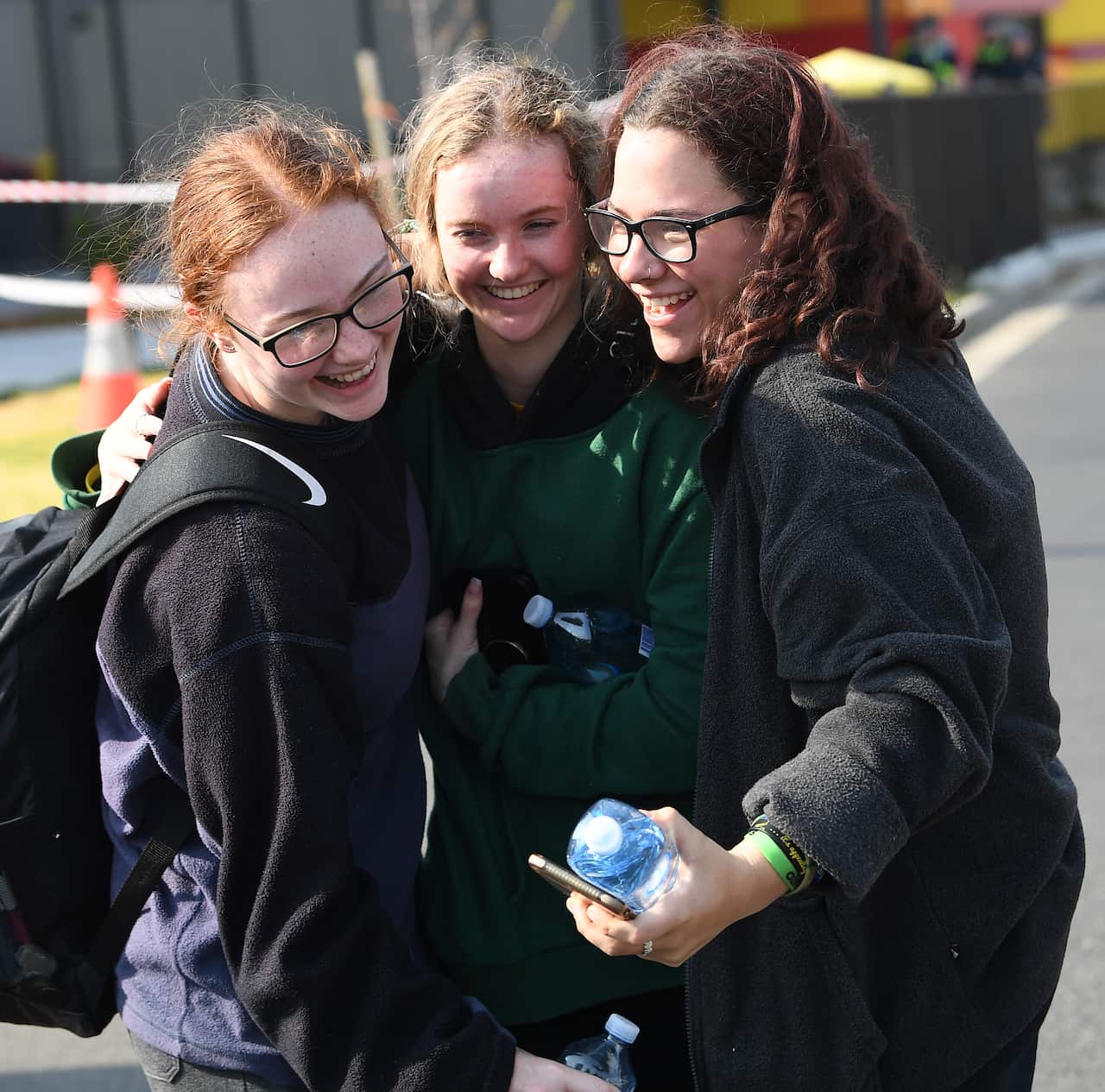 (L-R) Emily Wellington, Tahnee Meehan and Darcy Brown arrrive at the port of Hastings on MV Sycamore.