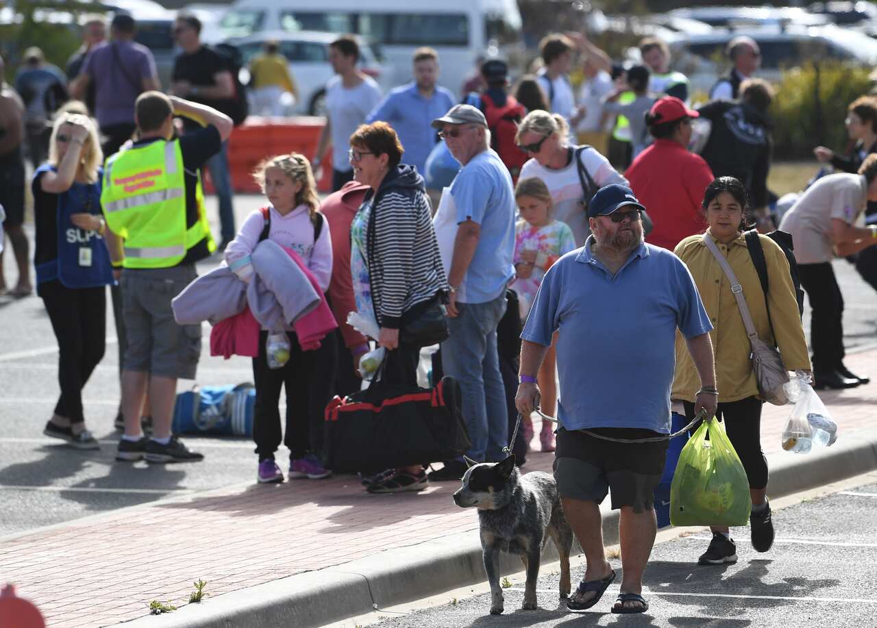 Mallacoota bushfire evacuees arrive at the Somerville Recreation Centre after being trapped for days.
