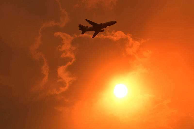 A DC-10 Air Tanker makes a pass to drop fire retardant on a bushfire in North Nowra, 160km south of Sydney, Saturday, January 4, 2020