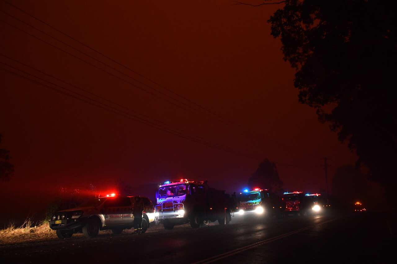 A Rural Fire Service strike team near a bushfire in North Nowra, 160 kilometres south of Sydney.