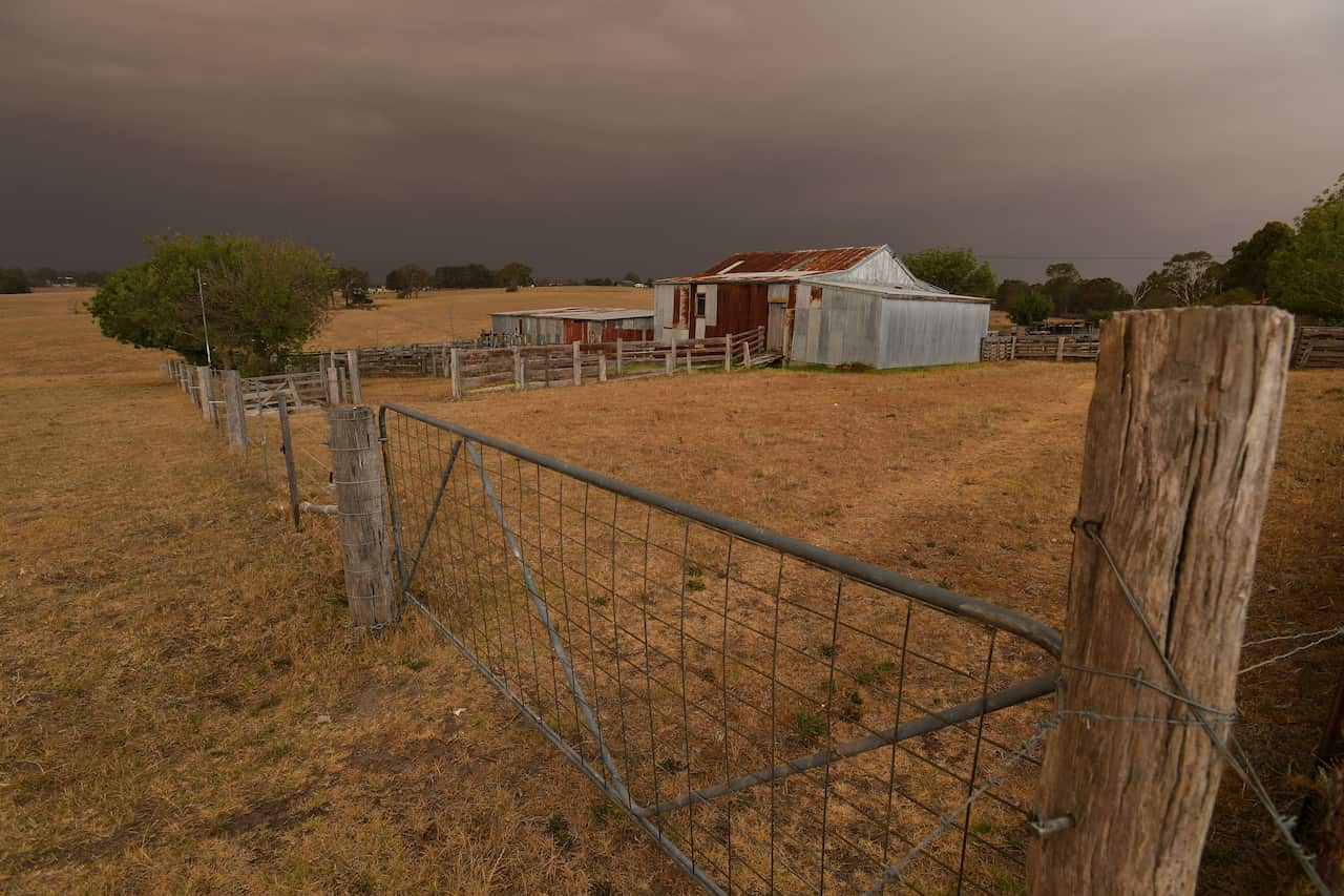 Bushfire smoke blankets a property at Bairnsdale, Victoria.