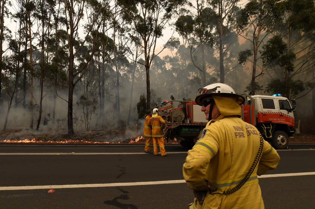 Firefighters contain a small bushfire south of Ulladulla last week.