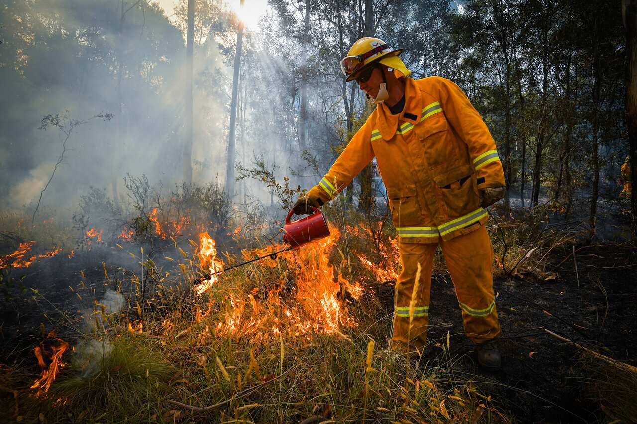 CFA strike teams performing controlled burning west of Corryong, Victoria.
