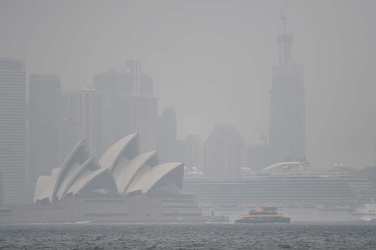 Heavy rain and clouds have replaced smoke over Sydney.